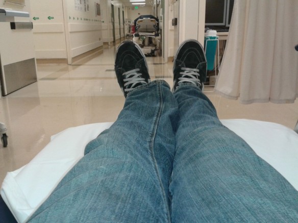 My legs while I wait on a stretcher in the Emergency Room. They wheeled me away for a CAT scan. 